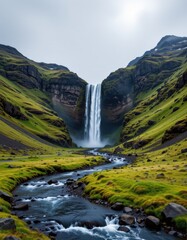 Fototapeta premium Majestic waterfall cascading through lush green valley iceland nature photography scenic view serene environment