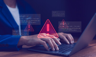 Cybersecurity warning concept. Warning icon and programming code. Data breach, system error, hacking attempt, software development issues and bug fixing process. Cyber security and IT support.