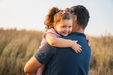 Portrait of happy daughter with her father.