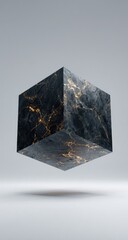 A dark, cubic form, seemingly made of marble with golden veining, hovers slightly above a light gray surface against a plain background