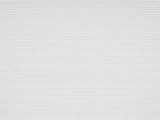 A pristine expanse of lined paper awaits the touch of pen, a silent herald of stories yet to be written