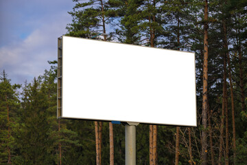 White billboard along the highway. Background for design and advertising.
