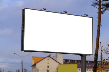 White billboard along the highway. Background for design and advertising.