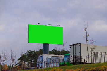 Background for design. Advertising billboard along the road in the city on a sunny day