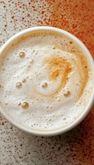 Top View of Delicious Latte with Intricate Foam Art in Smooth Light Golden and Creamy Colors