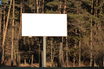 Advertising billboard along the road in the city. Background for design. 