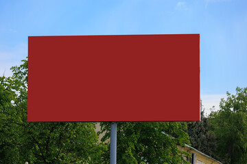 Background for design. Advertising billboard along the road in the city on a sunny day