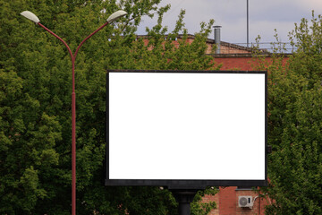 Advertising billboard along the road in the city. Background for design. 