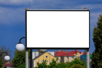 Background for design, white billboards on city streets and along roads in the summer day