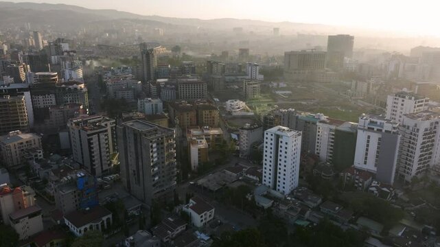 Addis Ababa City At Sunrise With Adey Abeba International Stadium Under Construction In The Distance In Ethiopia. - aerial shot