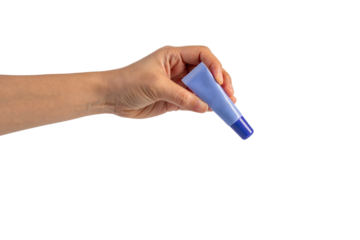 Purple packaging for cream, sunscreen or serum in hand on transparent background.