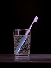 Electric Toothbrush Standing in a Glass of Water – Minimalist Dental Still Life