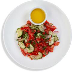 A salad with tomatoes, cucumbers, and onions on a white plate