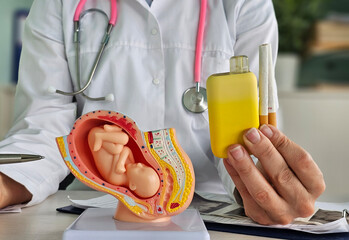 Harm from smoking, vaping and pregnancy, electronic cigarettes and vapes in the hands of a...