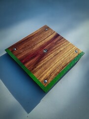 Square wooden tray with green trim