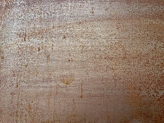 gritty corroded brown metal texture with speckled rust stains and weathered patina for industrial background, vintage design, branding, or grunge web element

