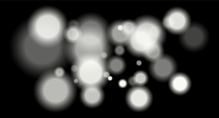 Large soft white bokeh circles with glow on black background, creating a dreamy abstract field. Suitable for festive, sci-fi or digital designs.