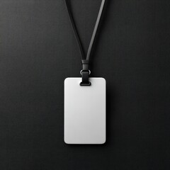 Blank name tag mockup hanging on a black background, ready for use in corporate identity design