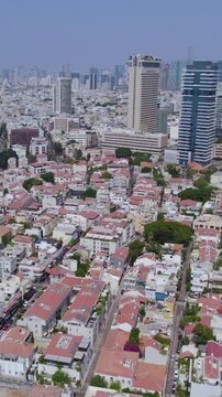 Neve Tzedek Tel Aviv neighborhood, from a high altitude by a drone on a summer day -Vertical video paning to right