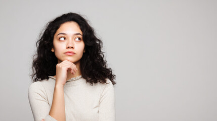 thoughtful linguist portrait positioned on left side of frame with clean ultrabright background