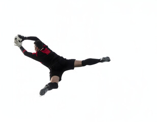 Goalkeeper diving to catch soccer ball on white background