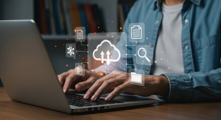 Hands actively manage data flow, visualized as a glowing cloud computing interface, on a laptop keyboard in a dimly lit workspace