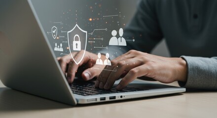 A person types on a laptop keyboard with cybersecurity and data protection icons displayed on the screen