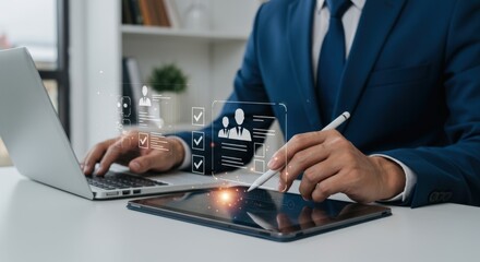 Businessman working on laptop and tablet with digital interface showing recruitment application checklist and candidate selection in a modern office
