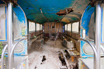 Abandoned Bus Interior Showing Decay and Weathering of the Structure