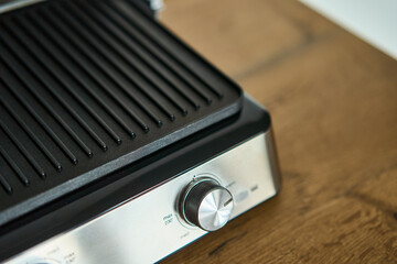 This electric grill has a nonstick surface and adjustable temperature controls for your convenience