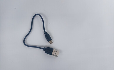 close up of Connector micro-USB, USB with cable, isolated on white background. Black cable for data transfer between devices.