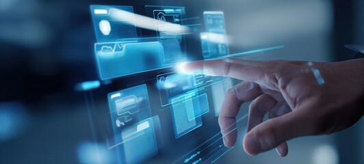 The hand interacting with a futuristic digital display interface.