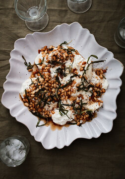 Burrata with endive rosemary and pine nuts