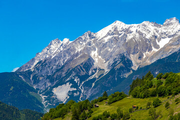 Lechtal Austria alpine mountain landscape panorama blue sky and snow.