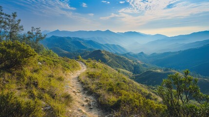 Fototapeta premium A winding path through mountains in a beautiful landscape