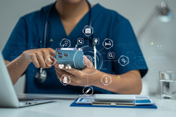 Doctor working with a tablet and smartphone search for medical information at the hospital office during the day.