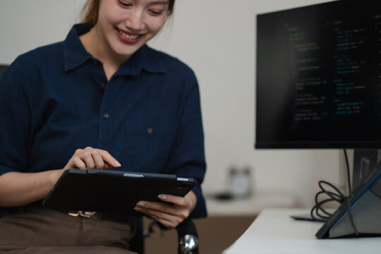 Hacking and malware concept. Hacker using abstract laptop with binary code digital interface.