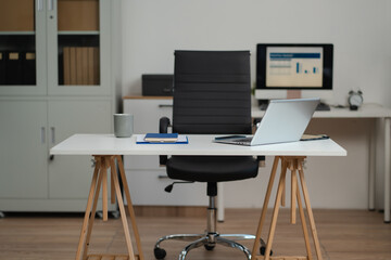 Modern workspace with Laptop, Tablet, and Smartphone on office Desk.
