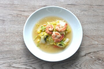 fried slice cabbage with shrimp in soy sauce on plate
