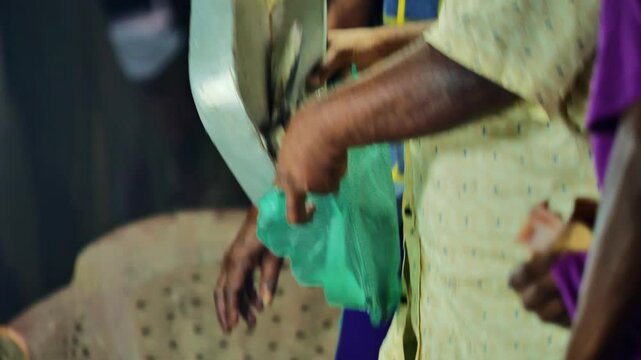Traditional fish market scene with colorful fish and old digital weighing scale.