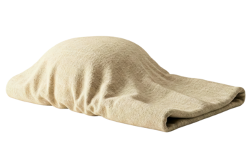Beige towel is draped softly over the hidden object creating gentle folds isolated on a transparent background
