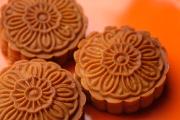 Mooncakes are traditional Chinese pastries, typically enjoyed during the Mid-Autumn Festival