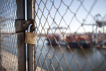 Gate of the cargo seaport is locked, a result of the embargo and the suspension of trade
