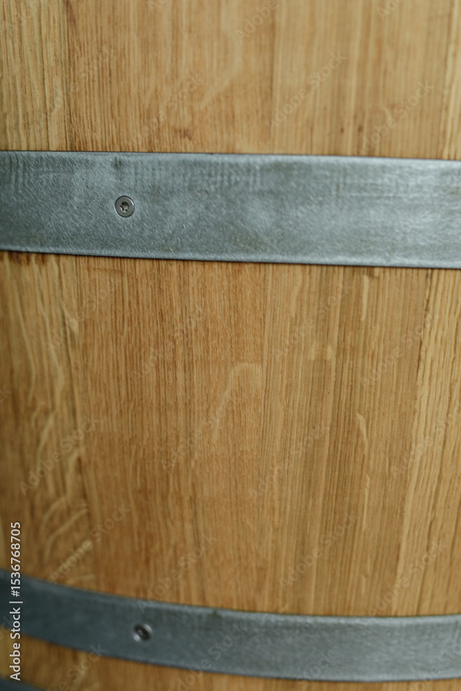 Poster high-resolution image of a wooden barrel's textured surface and metal bands. perfect for rustic desi
