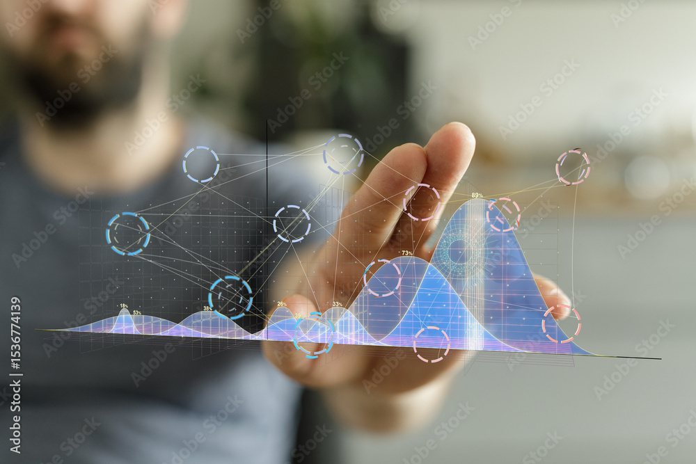 Poster stock photo of a person interacting with a holographic graph, showcasing business analytics and data