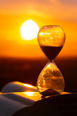 Summer sunset or sundowner view with an hourglass at Mount Bogenberg, Bogen, Danube, Straubing-Bogen, Bavaria, Germany
