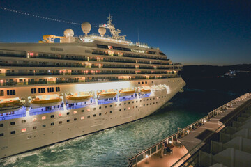 Obraz premium Mega family cruiseship cruise ship liner Fortuna docked at terminal in Marseille Provence, France during breathtaking sunset sunrise twilight blue hour dusk dawn silhouette scenic panorama