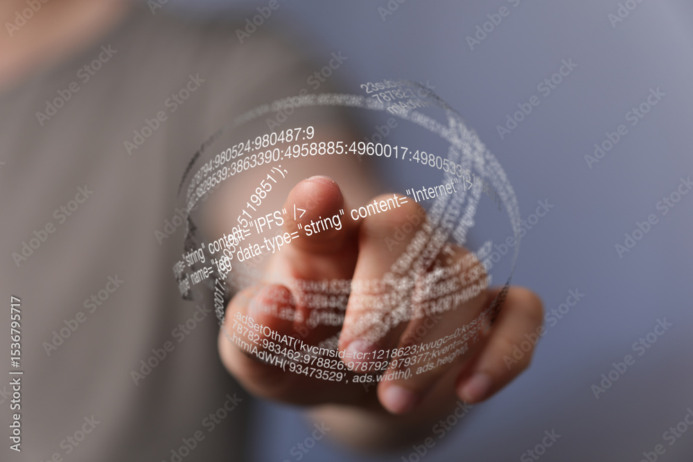 Poster Close-up of hand interacting with a transparent sphere of digital code, representing data visualization and technology.