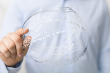 Close-up of a hand interacting with a digital sphere filled with code and data.