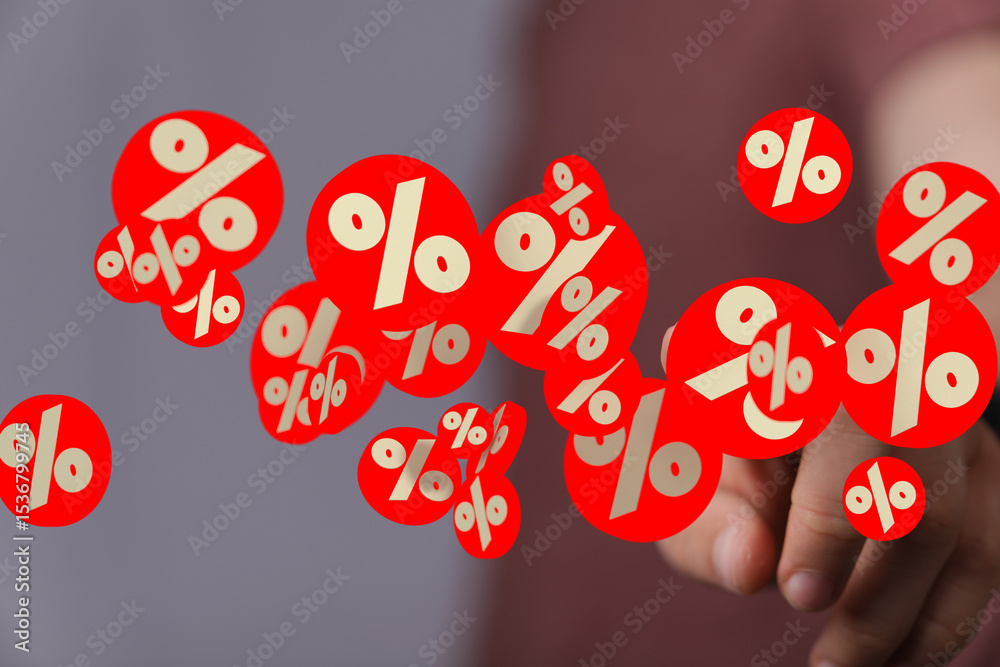 Poster Abstract image of red percentage symbols floating above a hand, ideal for sale and discount concepts.